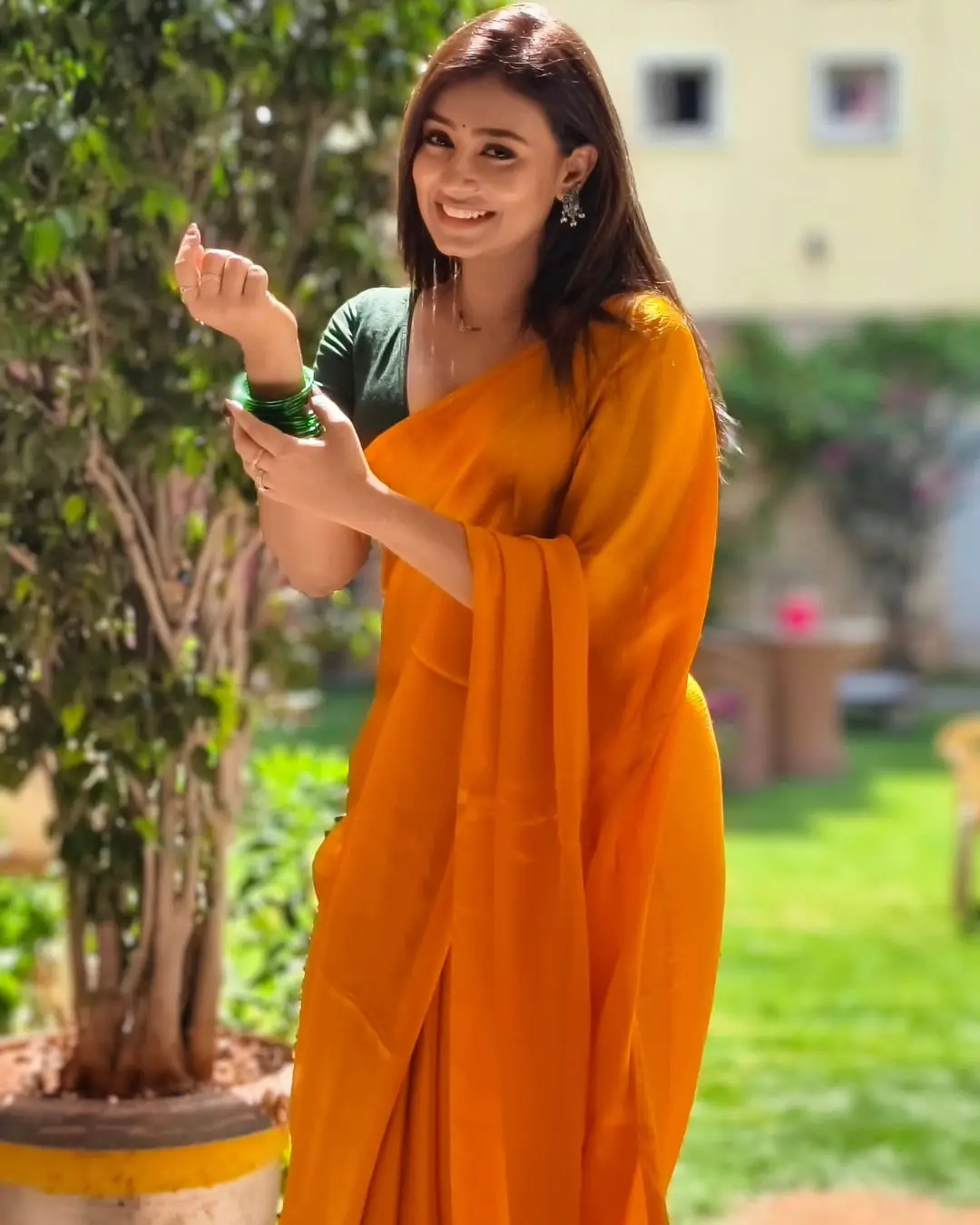 Telugu TV Actress Deepa Jagadeesh Stills In Orange Saree Green Blouse